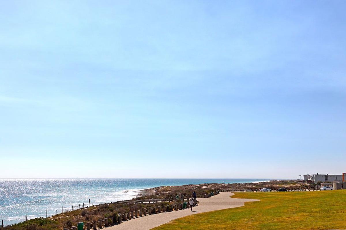 Eden On The Bay 118 By Hostagents Apartment Bloubergstrand Bagian luar foto