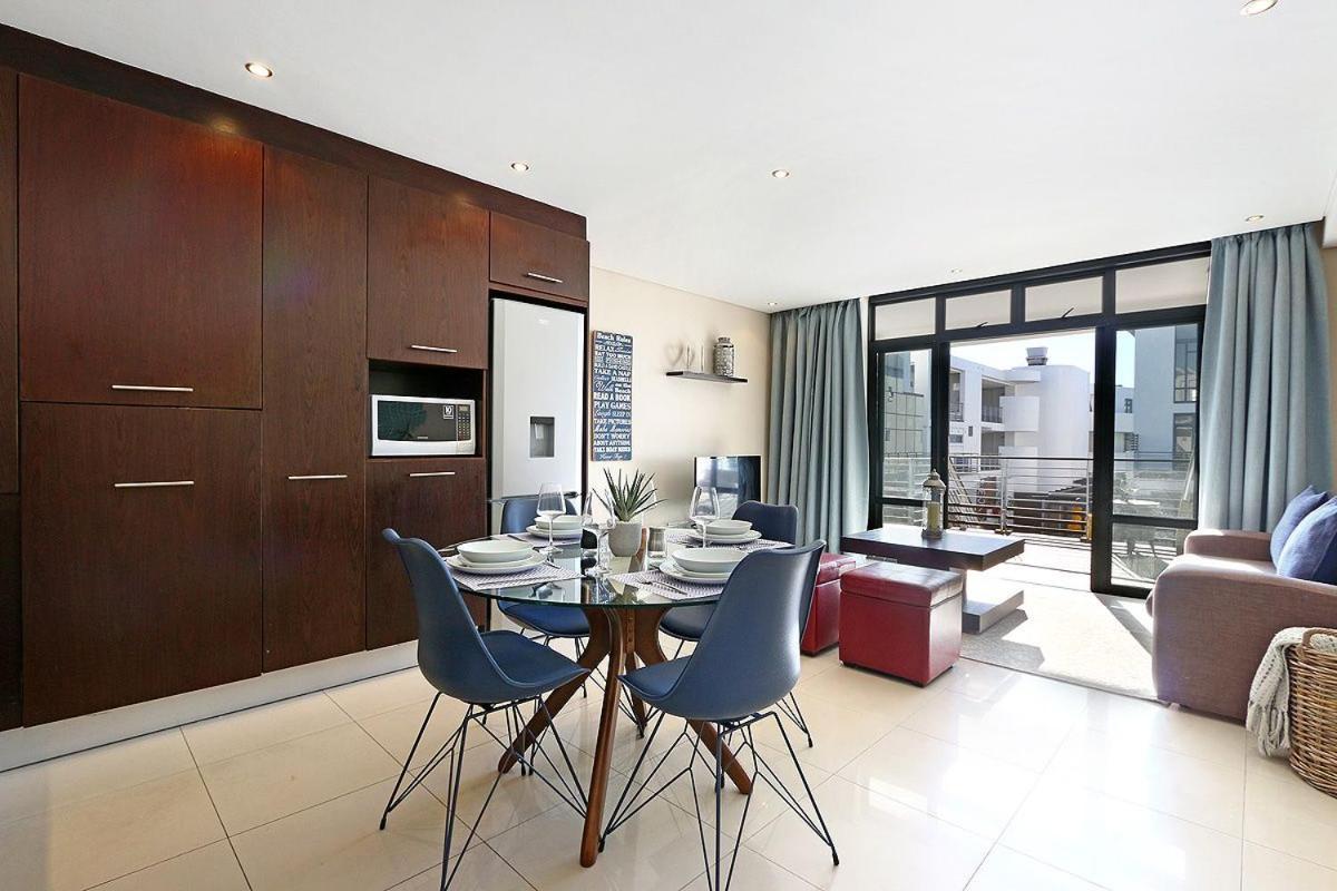 Eden On The Bay 118 By Hostagents Apartment Bloubergstrand Bagian luar foto