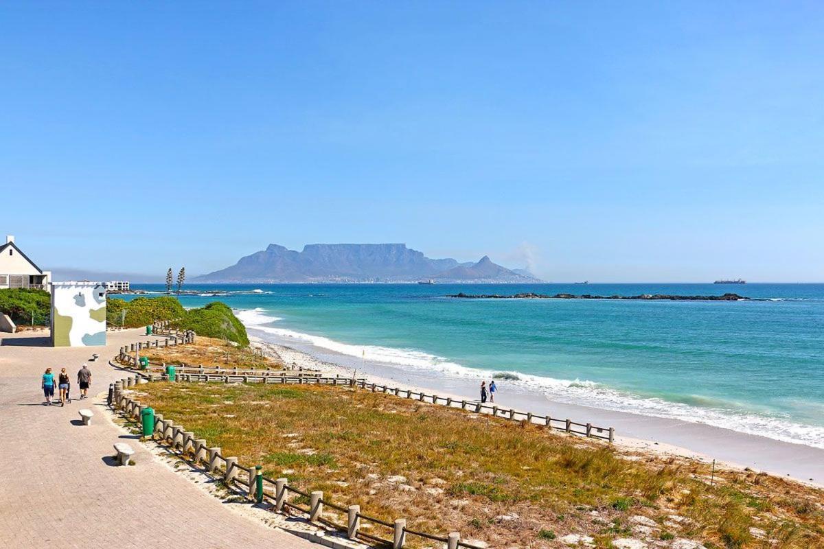 Eden On The Bay 118 By Hostagents Apartment Bloubergstrand Bagian luar foto
